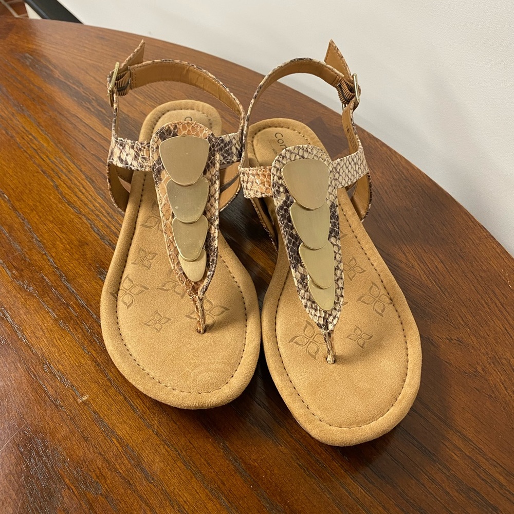 Animal print with metal details sandals size 7. Never worn.